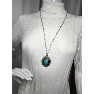silver tone pendant necklace with coordinating earrings turquoise colord pendant